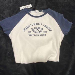 Garage Stormi Raglan Tee. Never been worn and still has tag